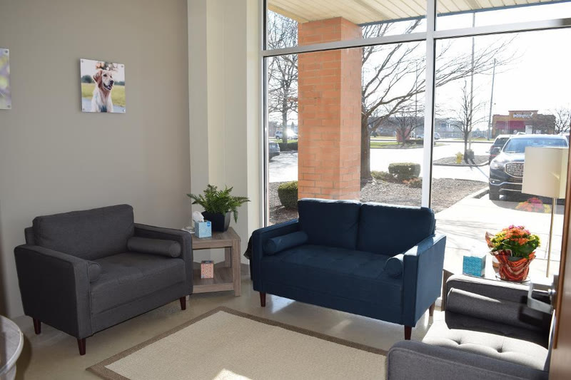 A seating area by the front windows